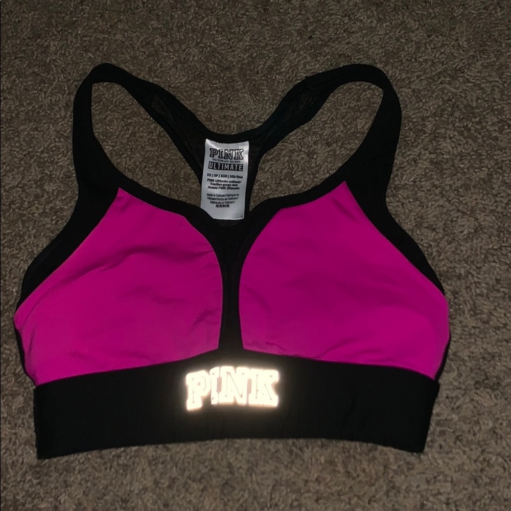 Pink Victoria’s Secret Ultimate Sports Bra.